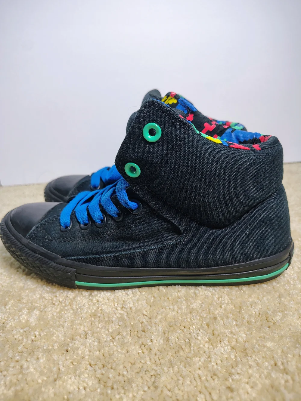 Converse All Star Kids' High-Top Sneakers in Black with Blue Laces